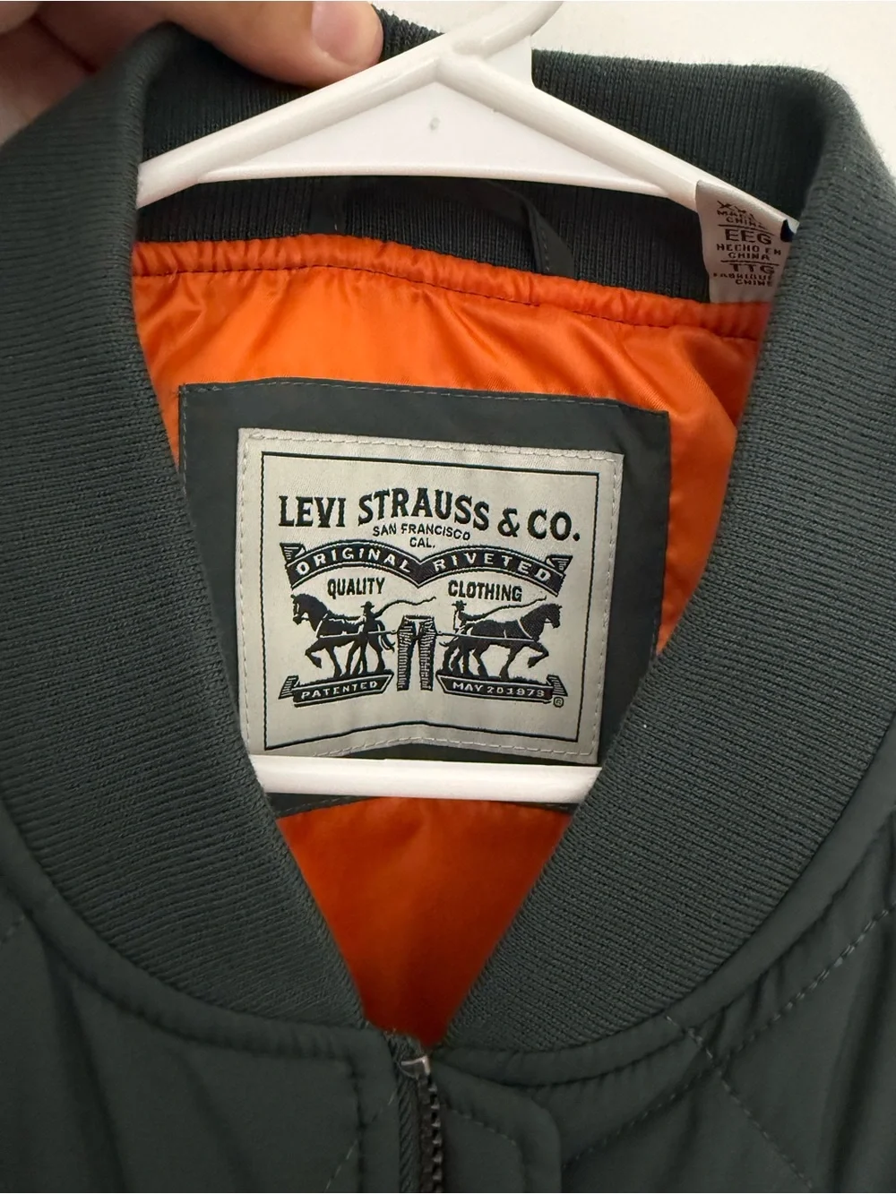 Levi's Quilted Bomber Jacket in Deep Green with Orange Lining